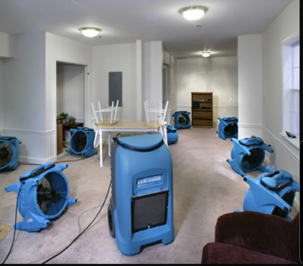 Air movers and dehumidifier setup for Water Damage Restoration in Babylon